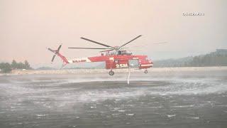 Helicopters Dipping Water From Lake Arrowhead For Line Fire