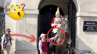 Lady keeps Touching the Kings Horse REINS