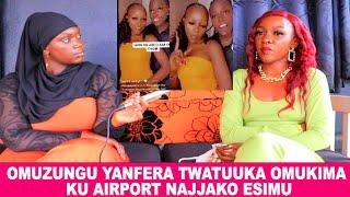 SANDIE WA CURE OKWELYA EBISIYAGA NDI  MUZADDEOMUZUNGU YANFERA NATUUKA KU AIRPORT NAJJAKO ESIMU