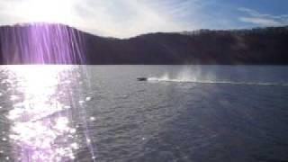 RC 2 stroke boat with 6+ foot Rooster Tail Skiping waves at 40+ Mph @ Brookville Lake IN