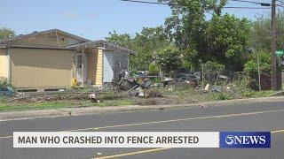 Man who crashed into neighborhood fence arrested by police