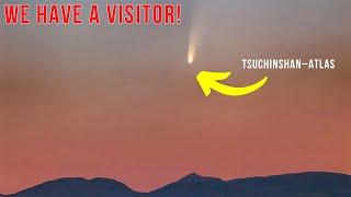 A Glowing Guest Comet Brighter Than Venus and Stars