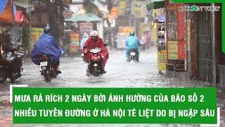 Mưa rả rích 2 ngày bởi ảnh hưởng của bão số 2 nhiều tuyến đường ở Hà Nội tê liệt do bị ngập sâu