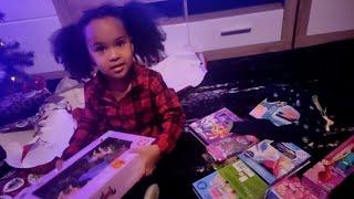 My 3year old opening her Christmas presentsgifts to buy for a toddler for ChristmasXmas gifts