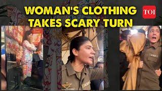 Pakistan Woman Mobbed by Angry Crowd over Arabic Text on Clothes  Female Cop saves Woman in Lahore