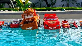 Disney Pixar Cars falling into deep pool Lightning McQueen Tow Mater Mack Sally Francesco
