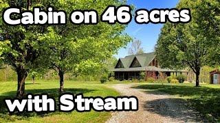 Artist Retreat Log Cabin style home on 46 acres Barn and Creek