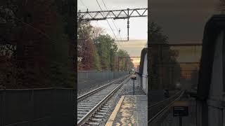 An NJT Express flying through MaplewoodNJ with a Four Car Arrow Set & a Shave & Haircut