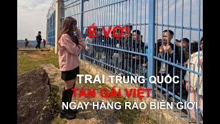 TRAI TRUNG QUỐC TÁN GÁI VIỆT NAM NGAY TẠI HÀNG RÀO BIÊN GIỚI. Chinese men flirt with Vietnamese girl