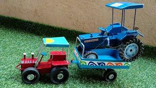 blue and multi colour tractors and trolleys video Kiran Toys world