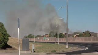 Colorado Springs firefighters battle two wildfires including one near airport