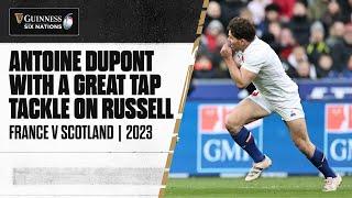 DUPONT MASTERCLASS   A cheeky tap tackle from Antoine Dupont on Finn Russell.