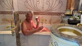 Peter in the fancy tub in suite aboard Sea Cloud II