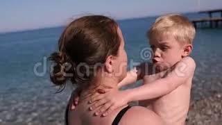 Mom kiss son