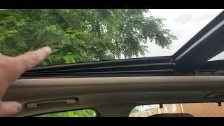 BMW x5 roof problem. roof partially stuck.