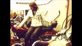 unknown biker woman in leather pants and overknee boots 1981