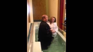 Chloe gets baptized