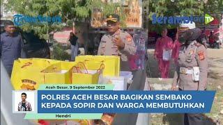 Kegiatan Jumat Berkah Polres Aceh Besar Bagikan Sembako Kepada Supir dan warga Membutuhkan