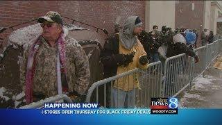 Shoppers line up outside Best Buy for Black Friday 2013