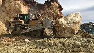 Caterpillar D8T Bulldozer Pushing Huge Stone - Labrianidis Mining Works