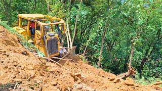 Skilled D6R XL Bulldozer Operator Process Building Road On Steep Mountain