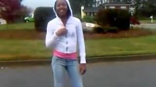 Bahja from the OMG GIRLZ Dancing   singing In the street on a rainy day