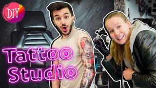 TATTOO STUDIO ERÖFFNET NEUER SHOP Die Crew macht sich temporäre Tattoos?