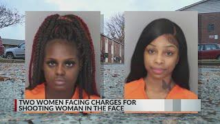 Two women charged after shooting woman in the face