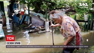 Погода в Україні у Дніпрі не припиняються зливи рівень води подекуди сягає 40 сантиметрів