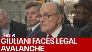 Rudy Giuliani speaks after jury awards $148M to election workers over 2020 vote lies