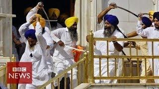 Sikh groups clash with swords at Indias Golden Temple - BBC News