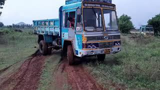 Ashok Leyland tipper stuck in mud