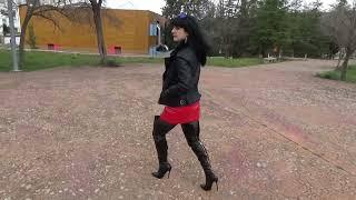 Victoria Devil winter outfit red vinyl miniskirt black latex bodysuit high heeled boots.