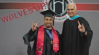 A-State football player making history by earning 3rd degree in 4 years