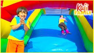 Ryan play in Inflatable Bounce House with Mommy and Daddy