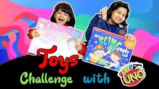 Toys Challenge with UNO  New Year Family Challenge  Cute Sisters