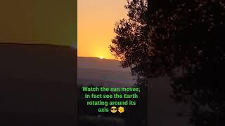 Sunset watch the sun moves in fact see the Earth rotating around its axis 