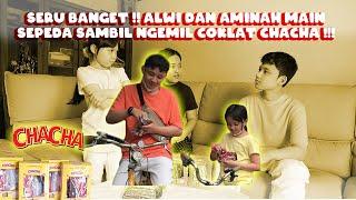 Seru banget  Alwi dan Aminah main sepeda sambil ngemil coklat favorit