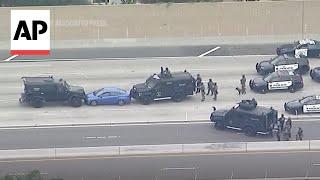 WATCH Standoff between police and suspect on California freeway