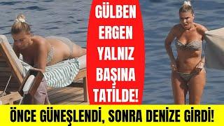 Gülben Ergen tatil sezonunu Bodrumda açtı Bikinisiyle şezlongta yalnız başına saatlerce güneşlendi