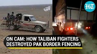 Watch Taliban destroy Pakistan fencing in southern Afghanistan as border face-off escalates