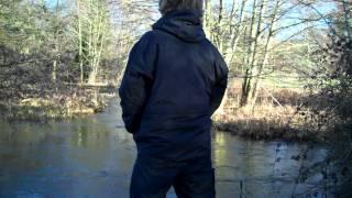 Urinating in nature - By a river