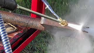 Wet sandblasting rusty metal using Northern Tools power washer adapter and coal slag.