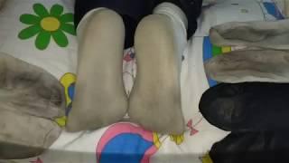 girl dirty white socks foot rest and trample on pillow 4