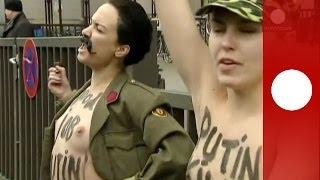 Topless against Putin Femen activists protest in Brussels