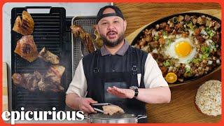 How A Filipino Chef Makes Traditional Pork Sisig  Passport Kitchen  Epicurious