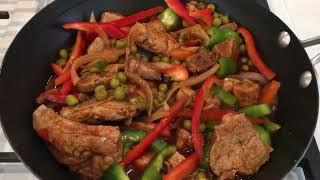 How to Make Pork With Sweet Peas and Peppers