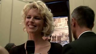 Eva Herzigova smiles to Mr Dolce&Gabbana