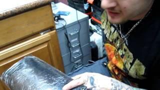 Jay tattooing himself part 1