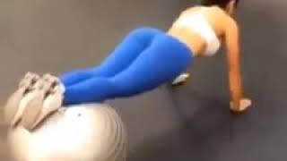Sexy Girl In Gym Doing exercise with Ball